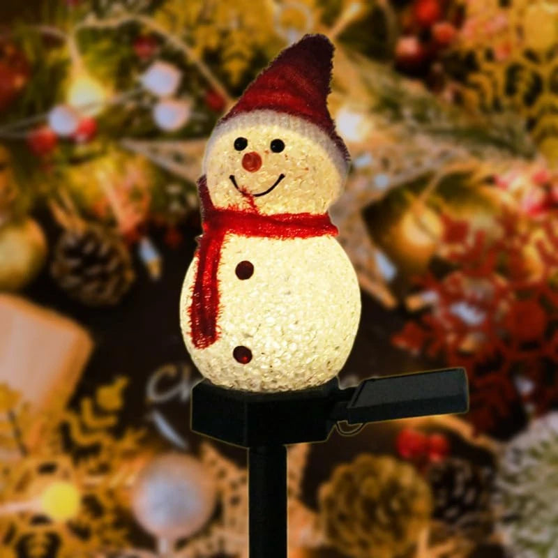 Muñeco de nieve solar iluminado de noche
